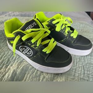 Heelys lace up with single wheel- kids size 4- like new- yellow and gray